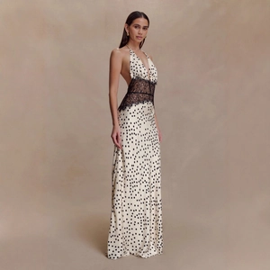 Elegant white polka dot V-neck maxi dress with black lace waist and open back design