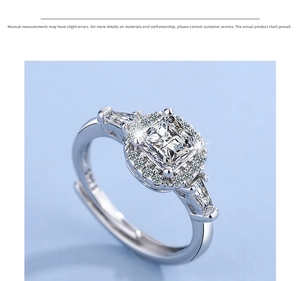 Macro view of princess cut square zirconia ring with baguette side diamonds on silver band