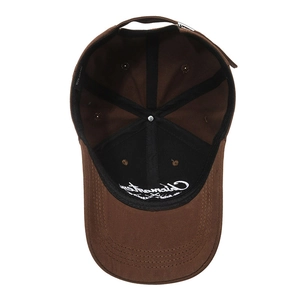 Inside view of a stylish brown cotton baseball cap with detailed white embroidery