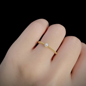 Elegant S925 sterling silver gold ring with white pearl on a minimalist beaded band