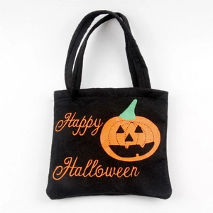 Felt Halloween pumpkin candy bag in black and orange with Happy Halloween print