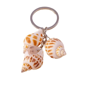 Metal keychain with three natural spiral seashells featuring brown spotted patterns