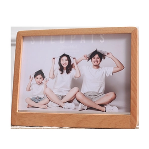 Minimalist trapezoid beech wood photo frame with natural grain and family portrait photo