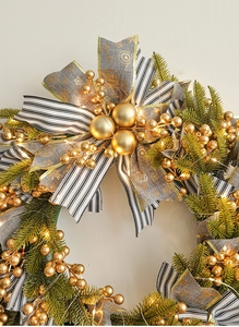 Close-up of 50cm Christmas wreath with gold ornaments, ribbons and warm LED lights