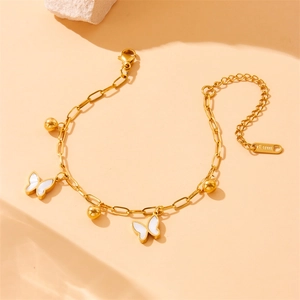 Golden stainless steel bracelet featuring butterfly charms and small bead accents
