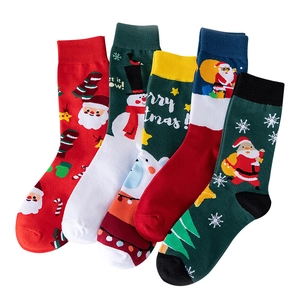 Set of 5 Christmas crew socks with Santa and reindeer patterns on white background