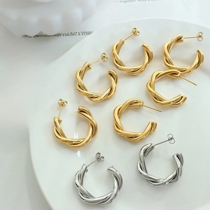 Chic 18K gold plated C-shape twisted hoop earrings in gold and silver finish