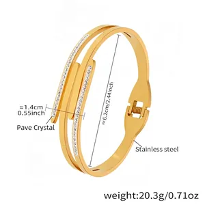 Detail view of gold-plated stainless steel double-layer open bangle with mud drill inlay