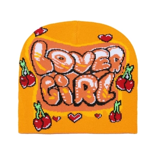 Detail of orange knit beanie with Lover Girl text, cherry and heart patterns