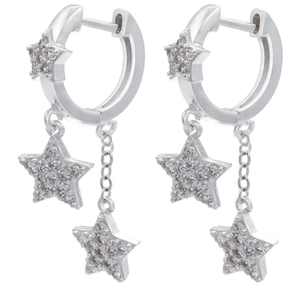 Detailed view of silver star earrings with micro-pave zircons and long tassel drop