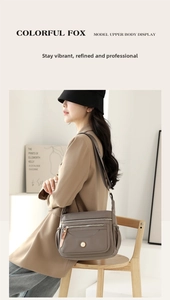 Lifestyle view of taupe multi-pocket waterproof nylon crossbody bag shown on a model