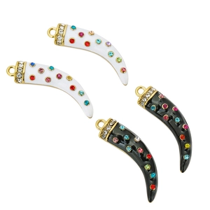 Horn crescent pendant in black and white enamel with colorful crystals and gold ring