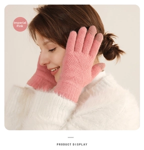 Detail of Noble Pink winter knitted gloves with thick fleece lining and cross-stitch texture