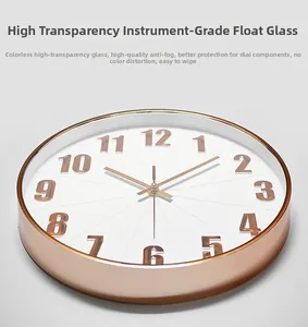 Detail view of anti-fog clear glass and 3D numbers on a rose gold silent wall clock