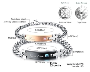 Detail of stainless steel couple bracelets with True Love engraving and zircon stones