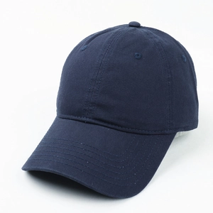 Close-up of navy blue cotton baseball cap fabric texture and fine stitching detail