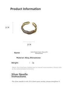 Detail of gold-plated wave ring showing 2cm diameter measurement and white rhinestones