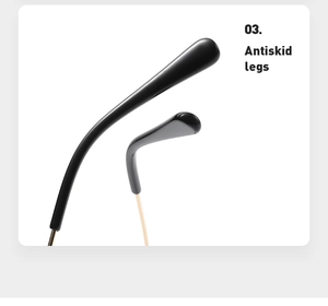 Close-up of black anti-slip tips on gold metal cat-eye frames for prescription glasses