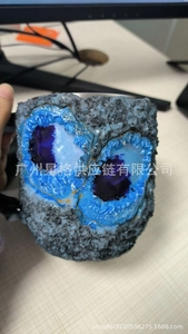 Detailed view of geode texture and purple crystal caves on creative coffee mug