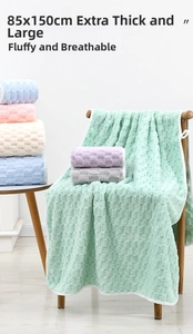 Detail of waffle textured microfiber bath towel measuring 85x150cm with soft pile