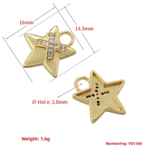 Detail view of double-sided 18K gold plated star pendant with sparkling cubic zirconia inlay