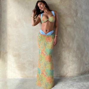 Three-piece vibrant printed set with crop top and high-waisted maxi skirt set