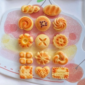 Miniature resin bakery charms set including croissants and butter cookies for DIY crafts