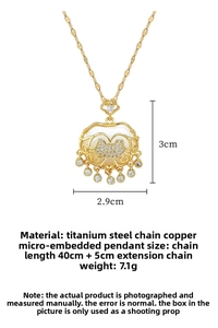 Detailed view of gold Chinese tassel lock necklace with micro-pave crystals and opal inlay