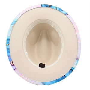 Detail of fedora hat interior showing 65% cotton blend label and marble art brim design