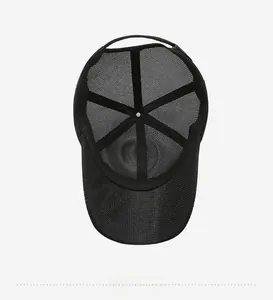 Detail view of the breathable mesh interior and reinforced seams on black baseball cap