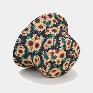 Double-sided sun hat with yellow sunflower print on black fabric for outdoor sun protection