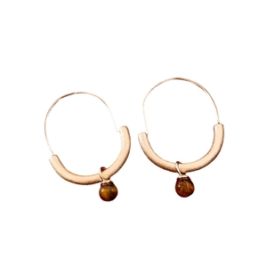 Retro rose gold matte hoop earrings with round tiger eye stone pendants on white background
