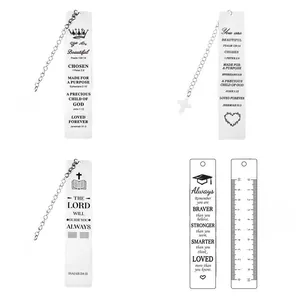 Detailed view of stainless steel bookmarks with scripture engraving and cross pendants