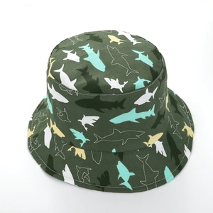 Detail of army green kids bucket hat featuring colorful shark patterns and stitched brim