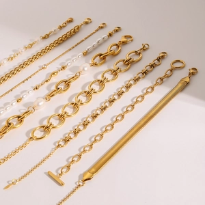 Gold stainless steel pearl bracelets and chain jewelry collection in parallel layout