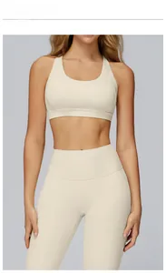 Detail view of khaki seamless yoga set with high-waist leggings and sports bra