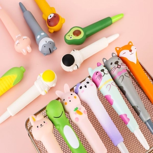 Creative cartoon squishy pens set with cute animal designs on a pink background