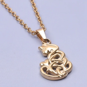 Detailed close-up of a gold-plated cat pendant featuring hollow Celtic knot design work