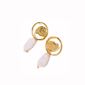Elegant gold baroque pearl earrings with irregular textured metal hoops in minimalist style