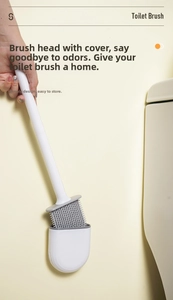 Detail of wall-mounted silicone toilet brush with detachable handle and ventilated holder