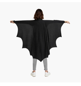 Rear view of black bat wing cape for kids party showing the fabric texture and structure
