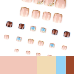 Assorted press-on toenails set featuring glitter, pearls, and tortoiseshell designs