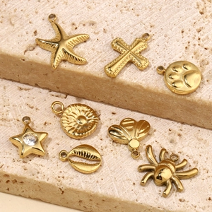 Set of 8 gold plated stainless steel charms including shell and cross for DIY jewelry making