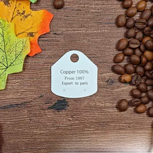 Pentagon white cardboard jewelry display tag with Copper 100% text for earrings