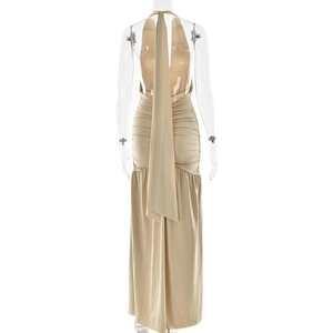 Detailed back view of champagne halter dress featuring elegant draping and back tie details
