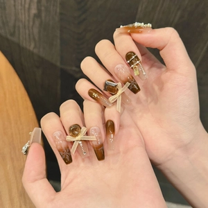 Brown gradient handmade press-on nails with 3D bows, pearls, and amber gems decoration
