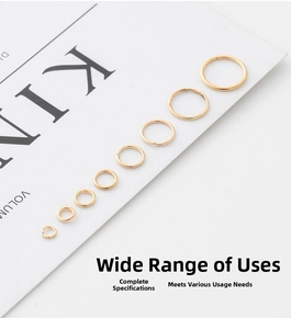 Macro view of gold-plated jump rings in various sizes for DIY jewelry making