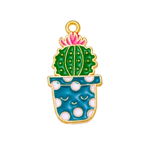 Macro shot of cartoon cactus pendant with blue flowerpot for DIY jewelry making