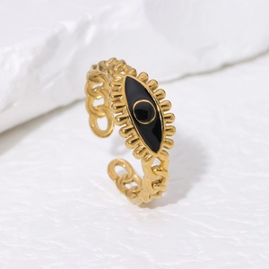 Macro detail of 18K gold-plated Evil Eye ring featuring black enamel and link chain band