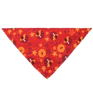 Détail d'un bandana rouge pour chien avec motifs de dinde et citrouille de l'Automne